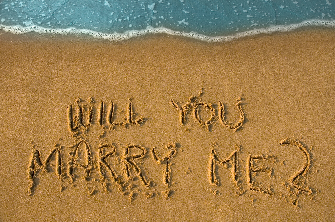 Heiratsantrag am Strand